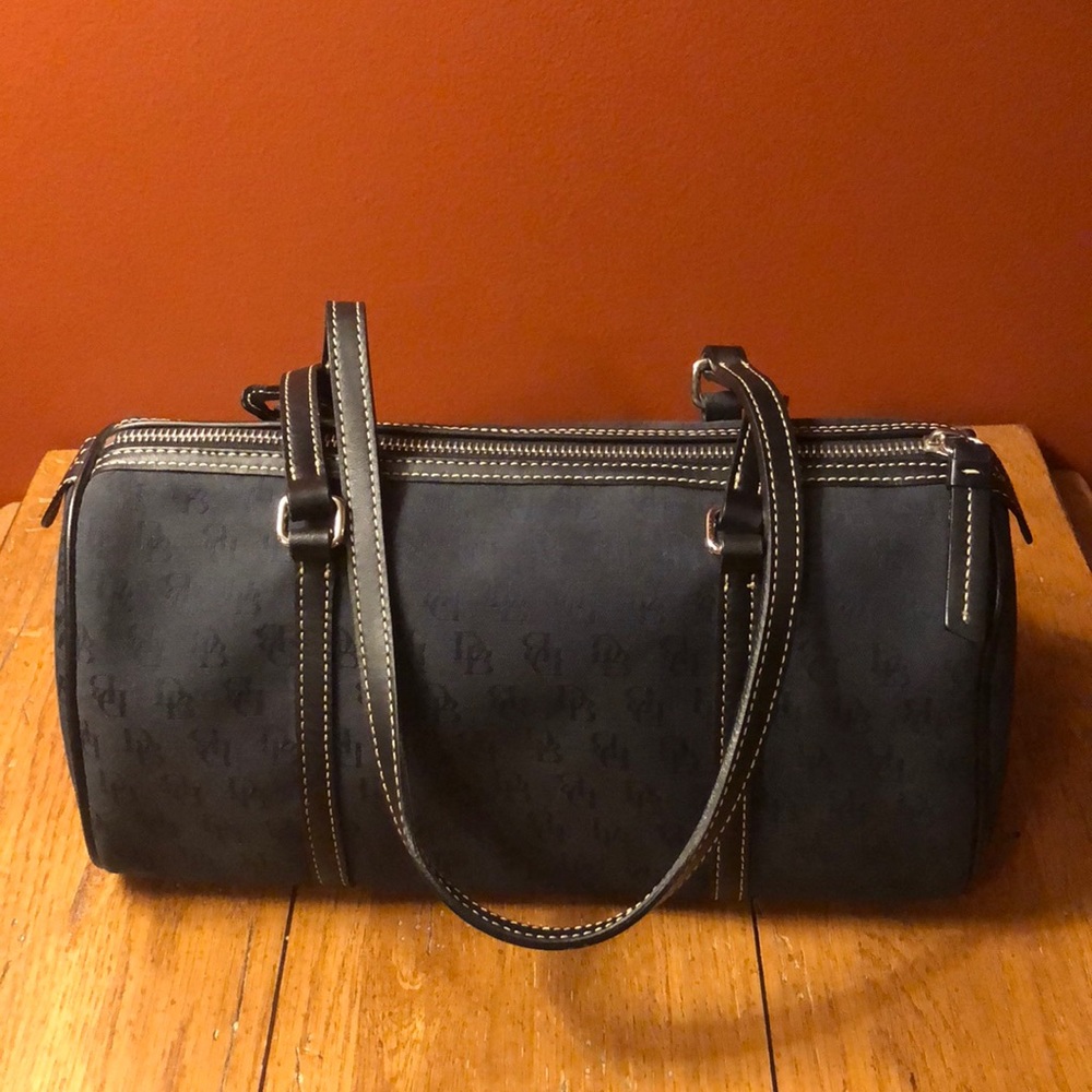 Dooney & Bourke black on black signature fabric.